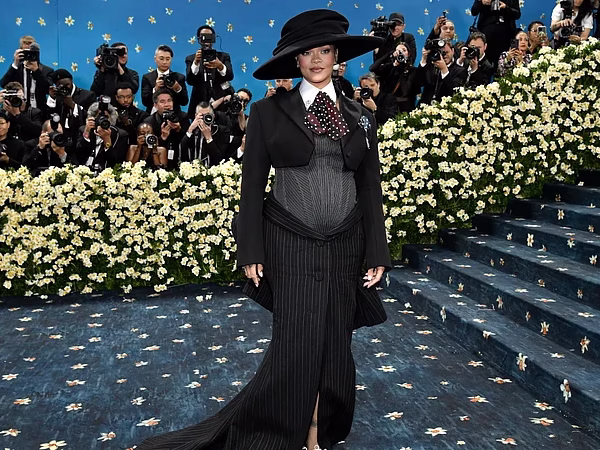 Rihanna Reveals Baby Bump at Met Gala 2025 in Stunning Marc Jacobs Look
